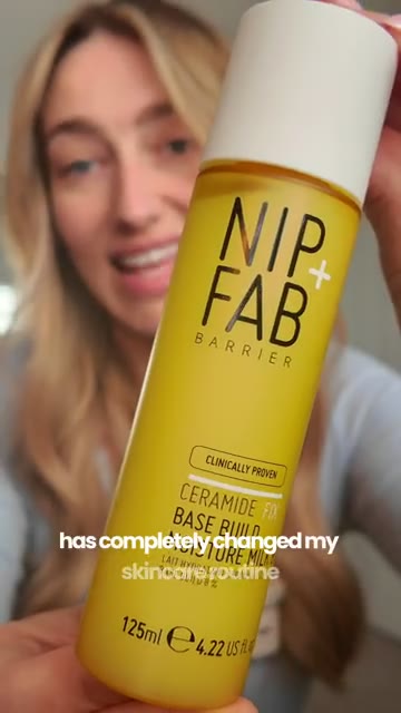 Creator holding a skincare product